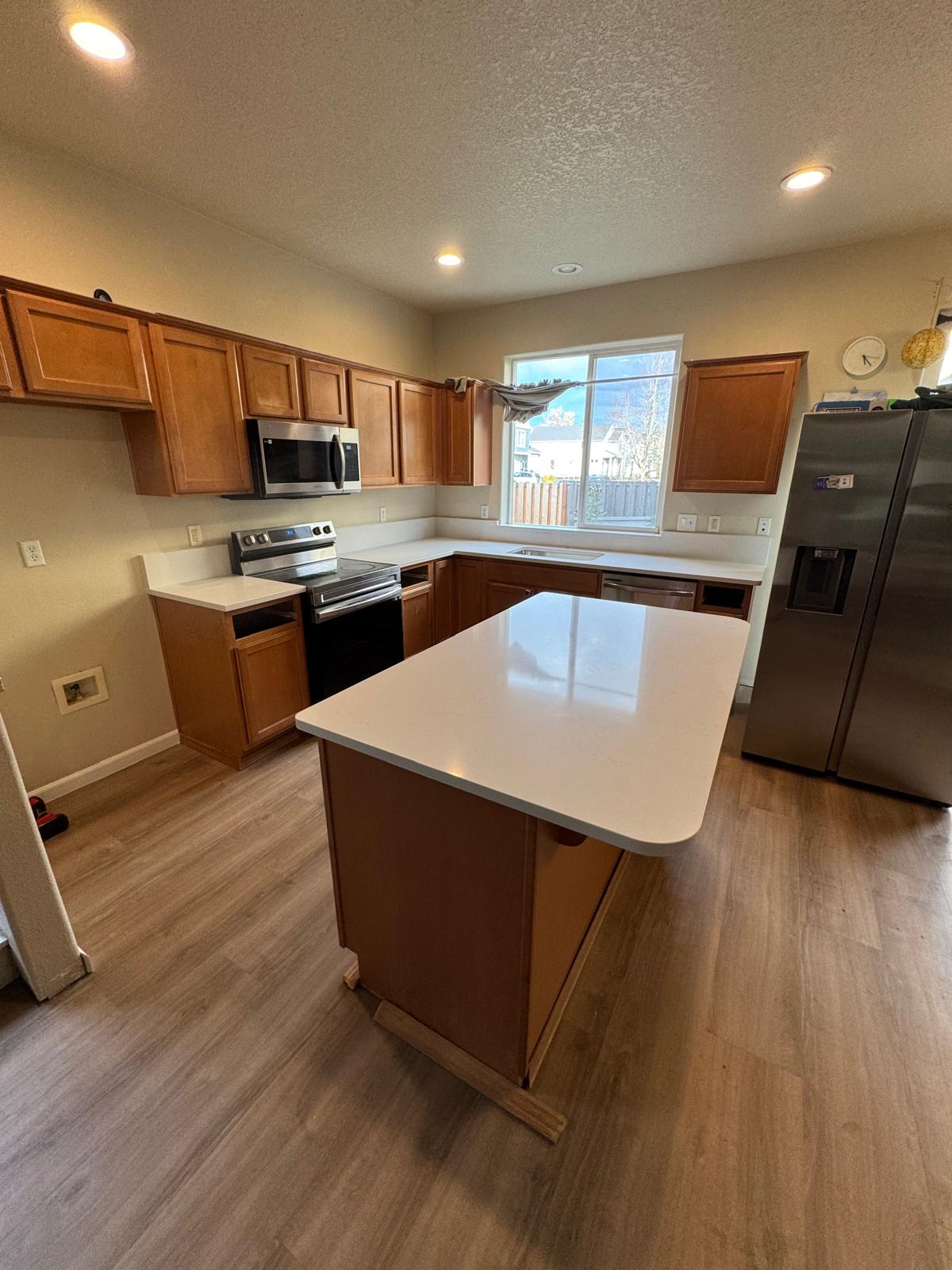 Contemporary White and Brown kitchen cabinets